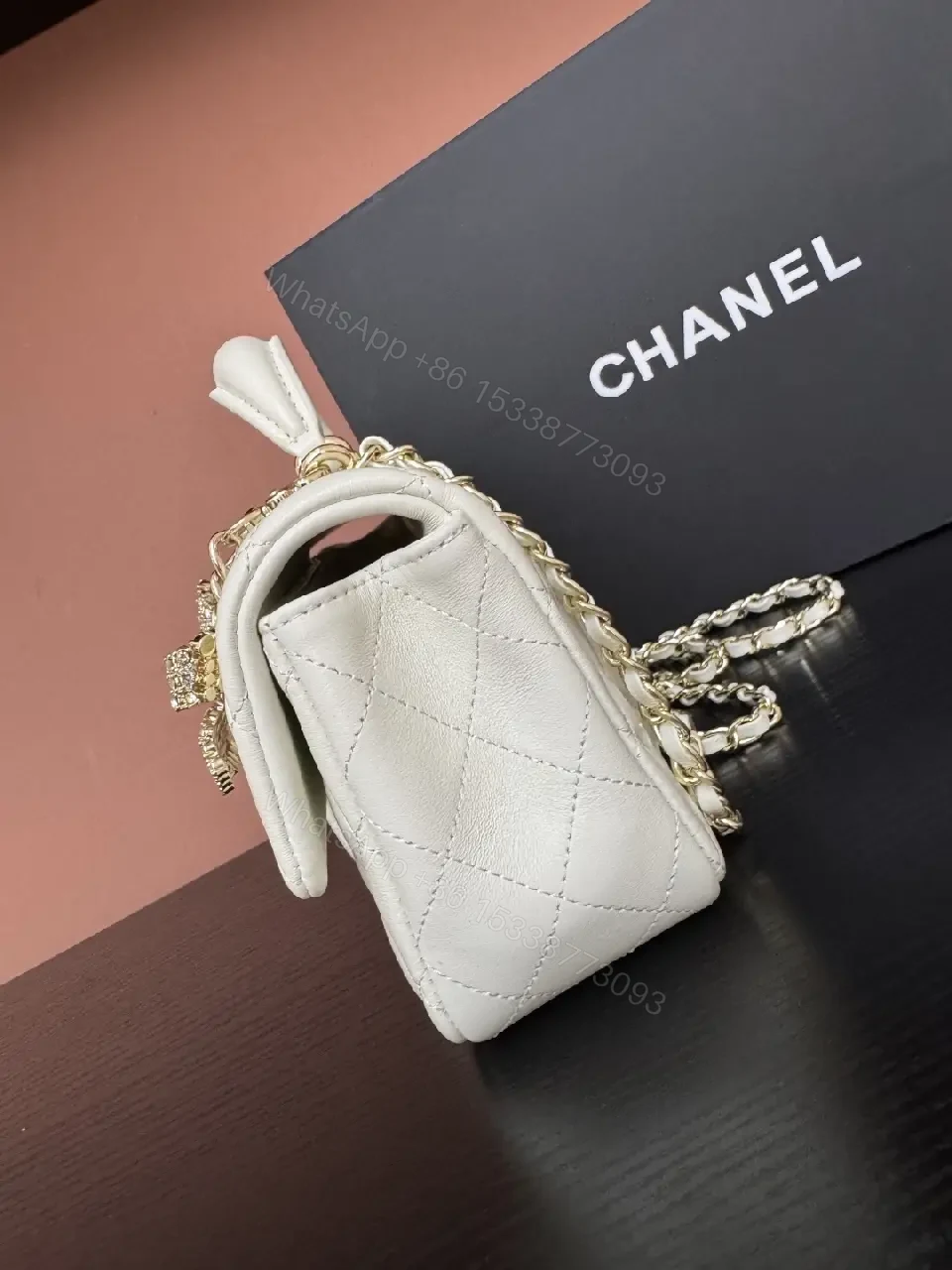 View 4 of White Quilted Luxe Handbag with Diamond Bow Charm - Satchel Style