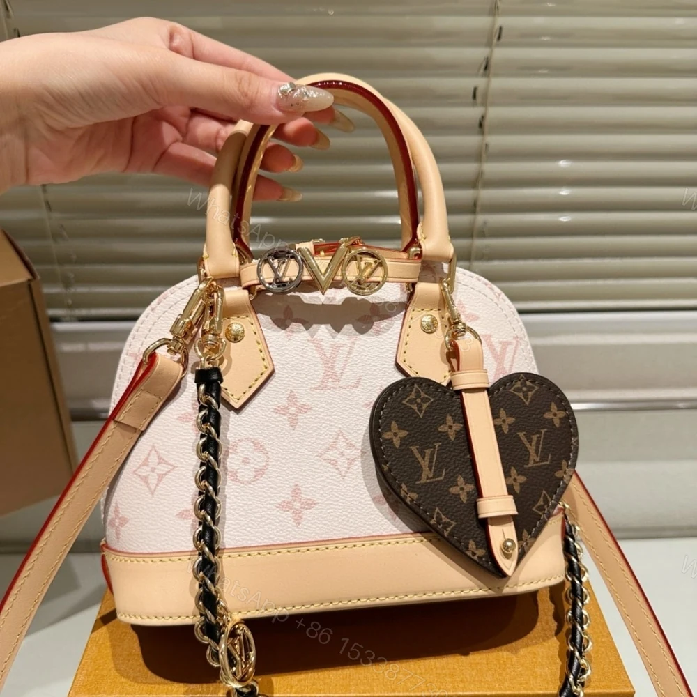 View 4 of Louis Vuitton Alma Mini LV And I Monogram Dune 25Cm K00015