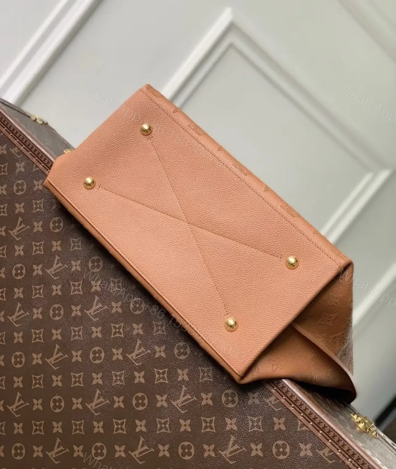 View 4 of Louis Vuitton Carmel Mahina Leather Hobo Bag in Cognac