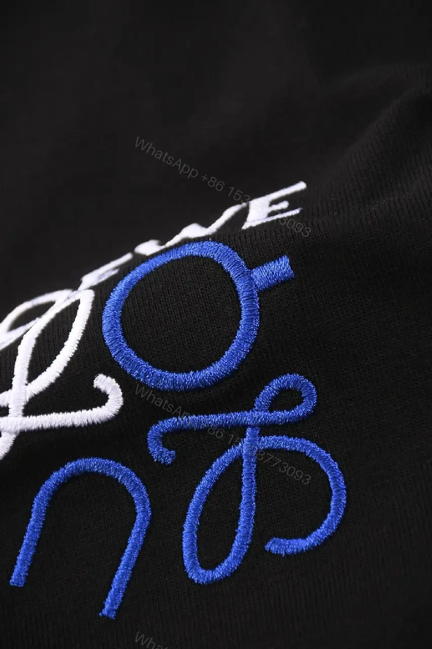 View 2 of Black Cotton Tee — Premium Comfort, Subtle Signature Detail, Modern Fit