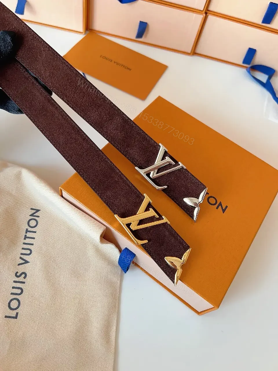 View 8 of Textured Leather Belt with Gold LV Buckle - Luxury Accessory Belt