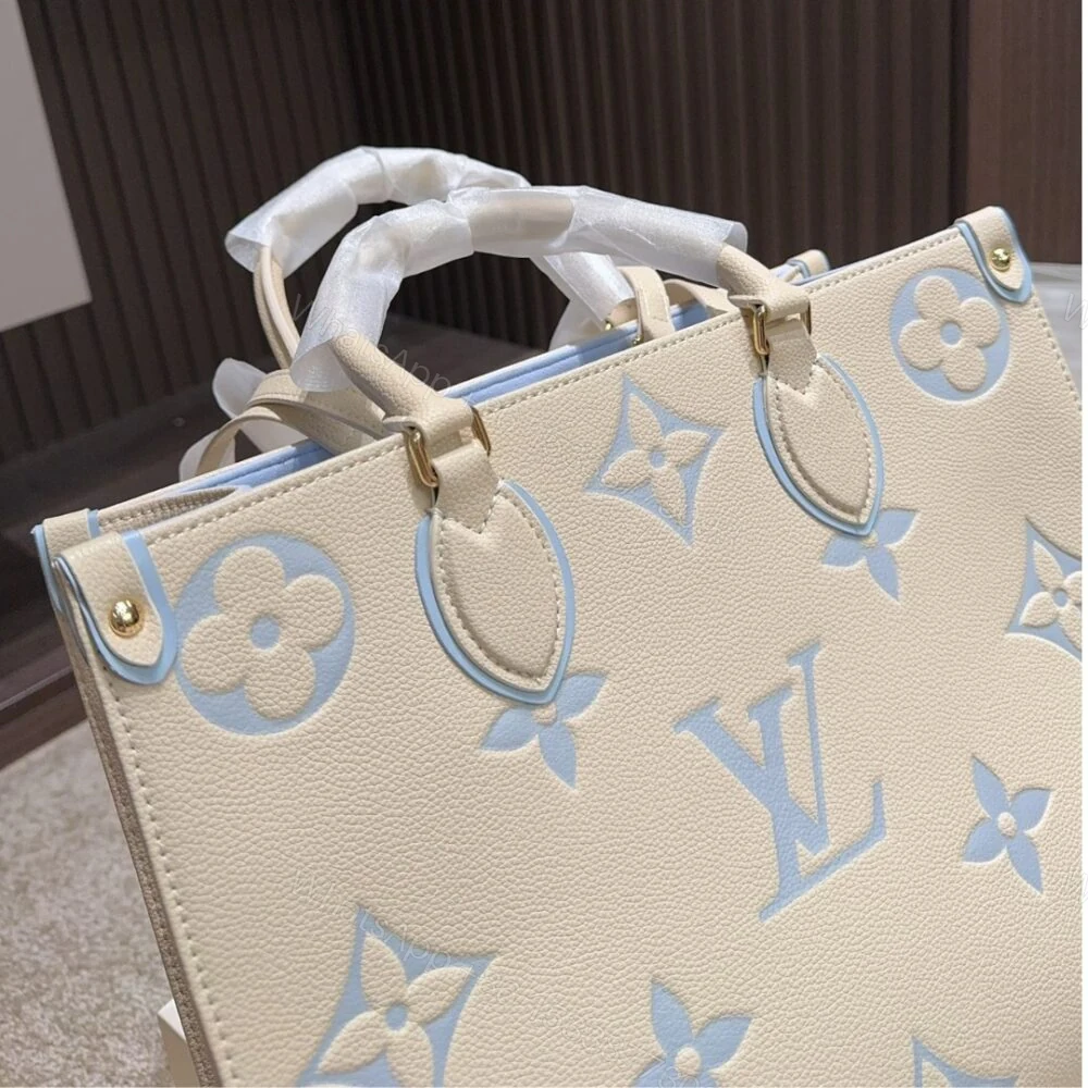 View 3 of Louis Vuitton Onthego PM Candy Blue 25Cm M46833