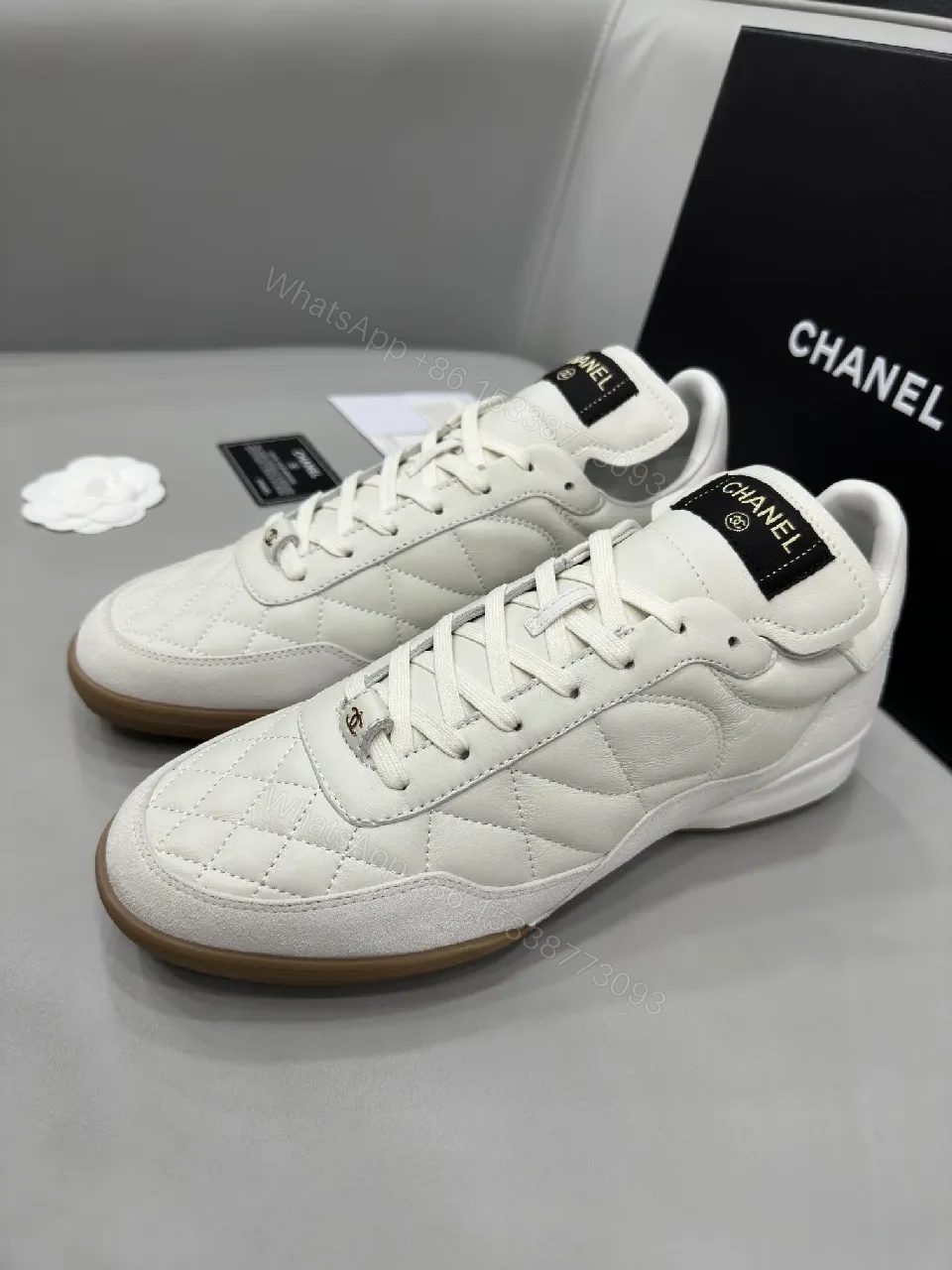 View 5 of White Quilted High-Top Leather Sneakers with Signature Details