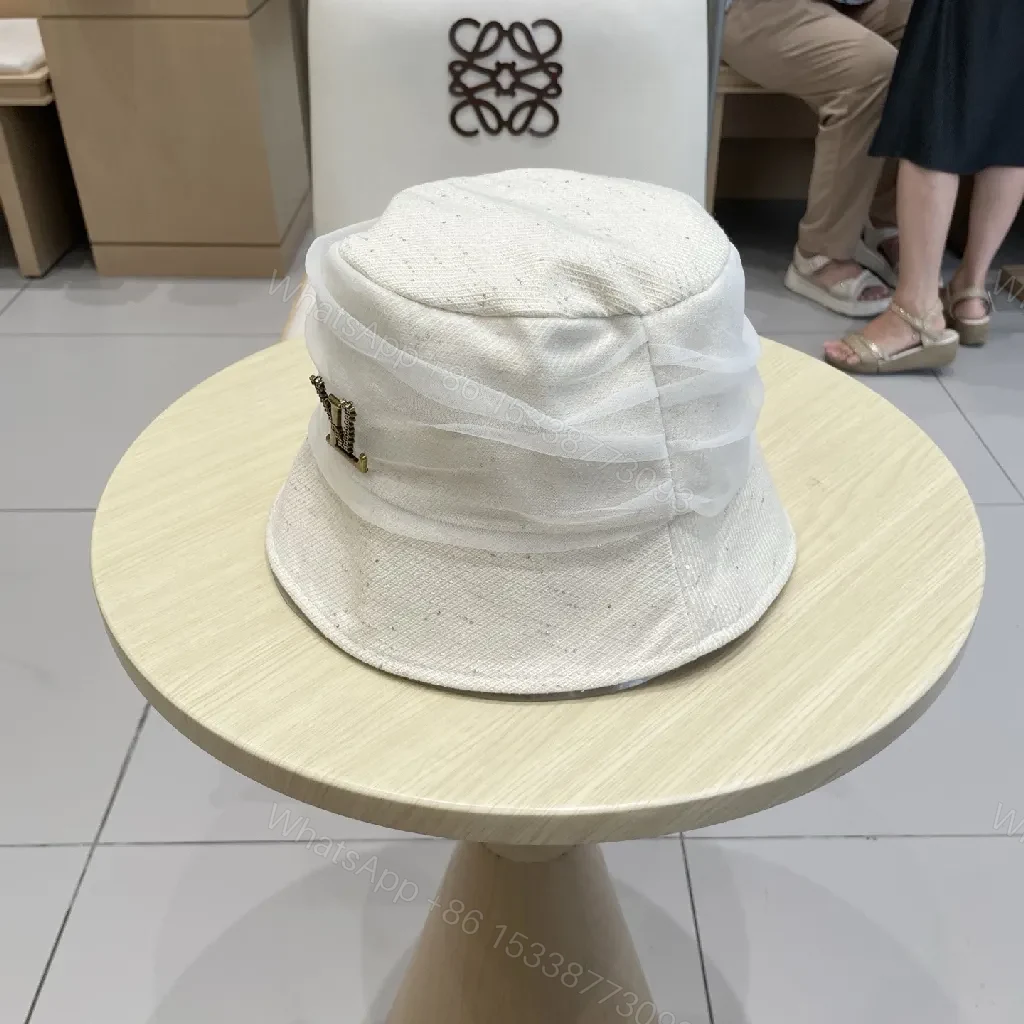 View 2 of Chic White Knit Bucket Hat with Gold Accent