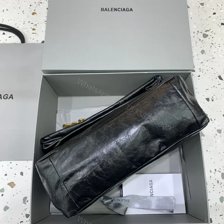 View 7 of Chic Black Leather Shoulder Bag with Gold Chain Straps
