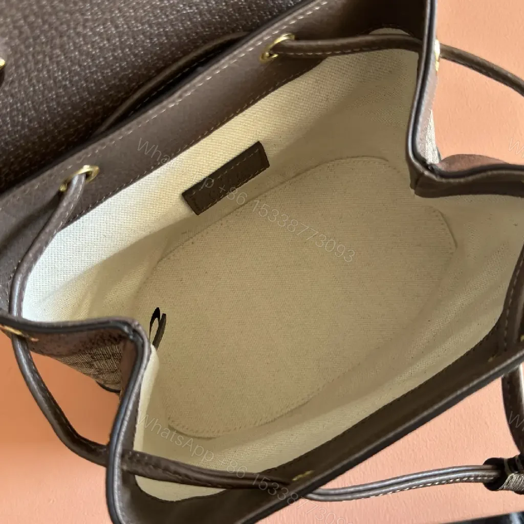View 9 of Compact Signature Crossbody: GG Supreme, Web Strap, Mini Bag