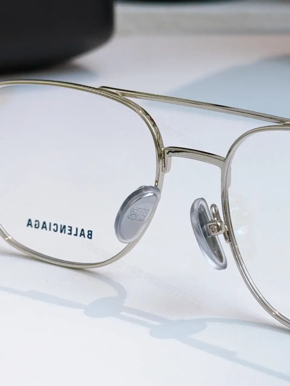 View 5 of Silver Metal Aviator Sunglasses: Luxe Slim Frames with Logo Detailing