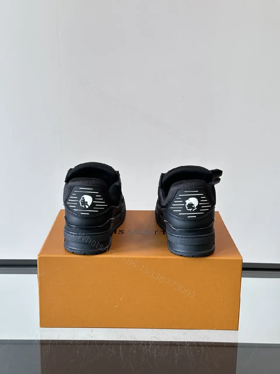 View 3 of Minimalist Black Leather Sneakers: Subtle Luxe Detailing High-Top