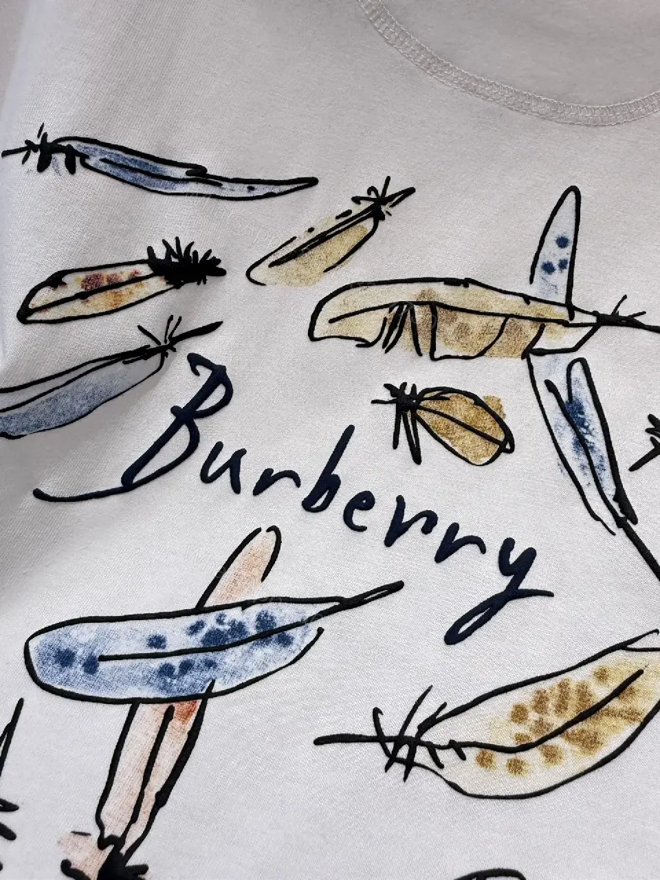 View 10 of White Cotton Oversized T-Shirt with Burberry Graphic Front