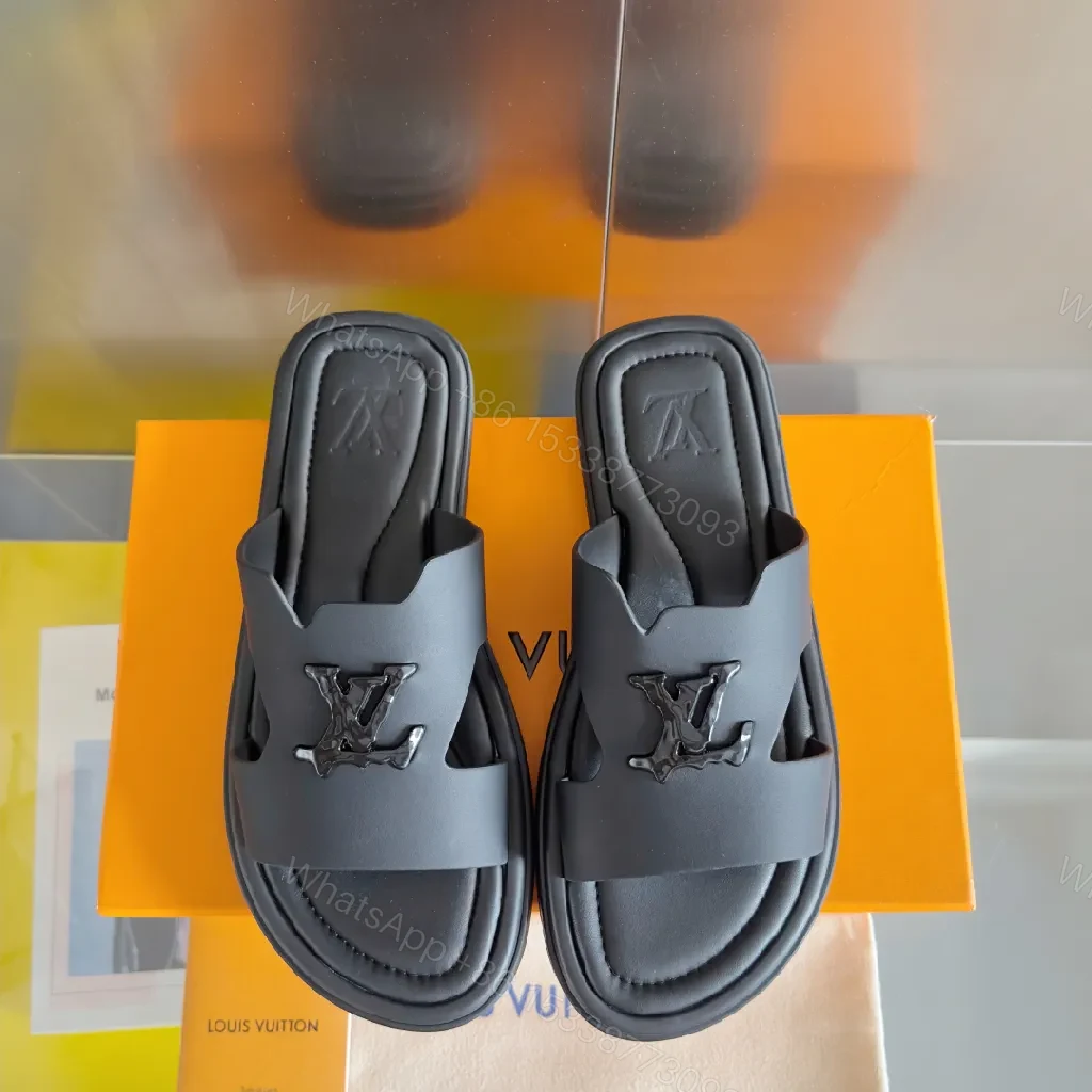 View 4 of Minimalist Black Leather Slides with Signature Emblem
