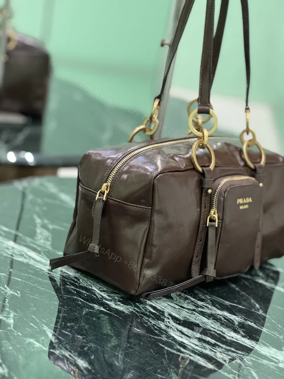 View 8 of Chic Black Leather Handbag with Gold Hardware & Structure