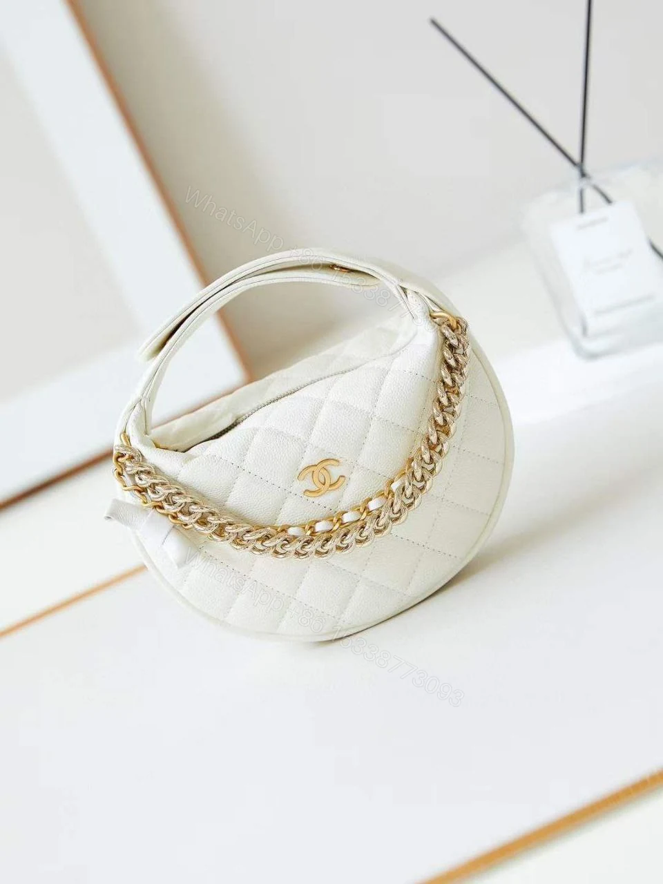View 3 of Chanel Shiny Caviar Quilted Bow Pouch Hobo
