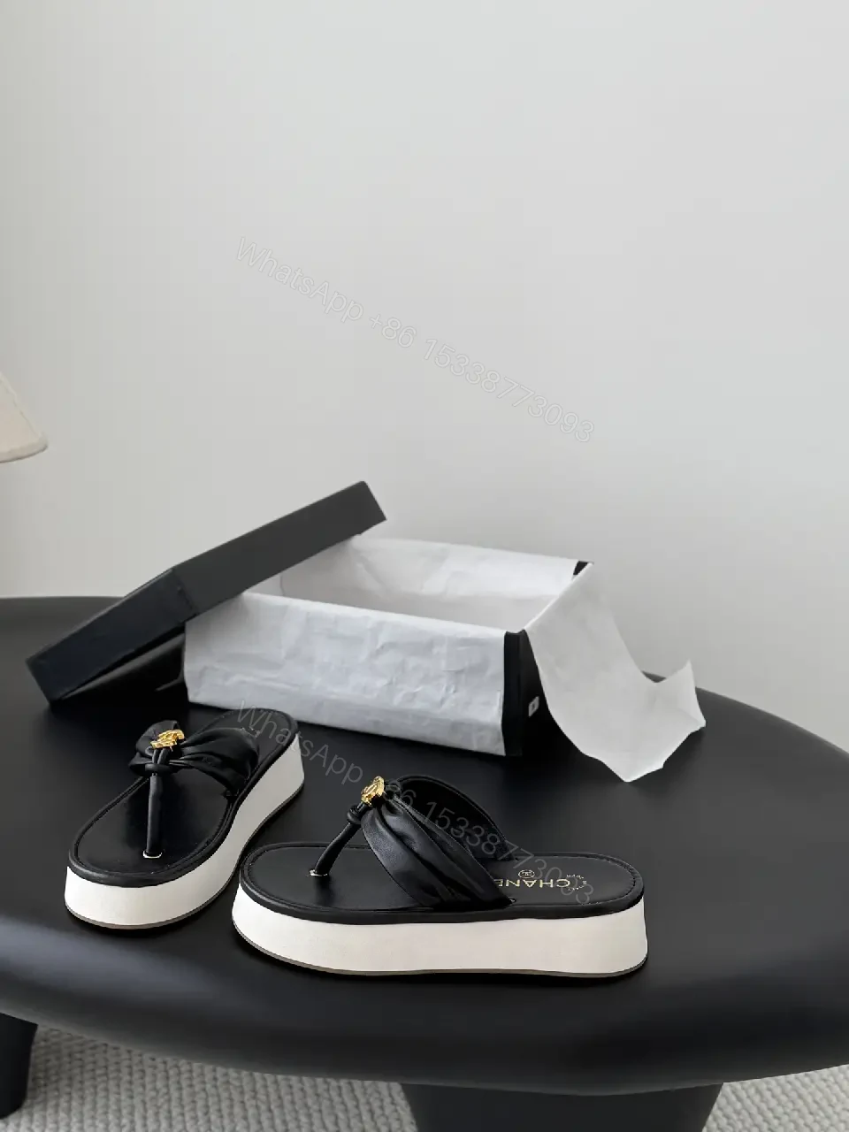 View 4 of Black Leather Slide Sandals with Gold Chanel Logo