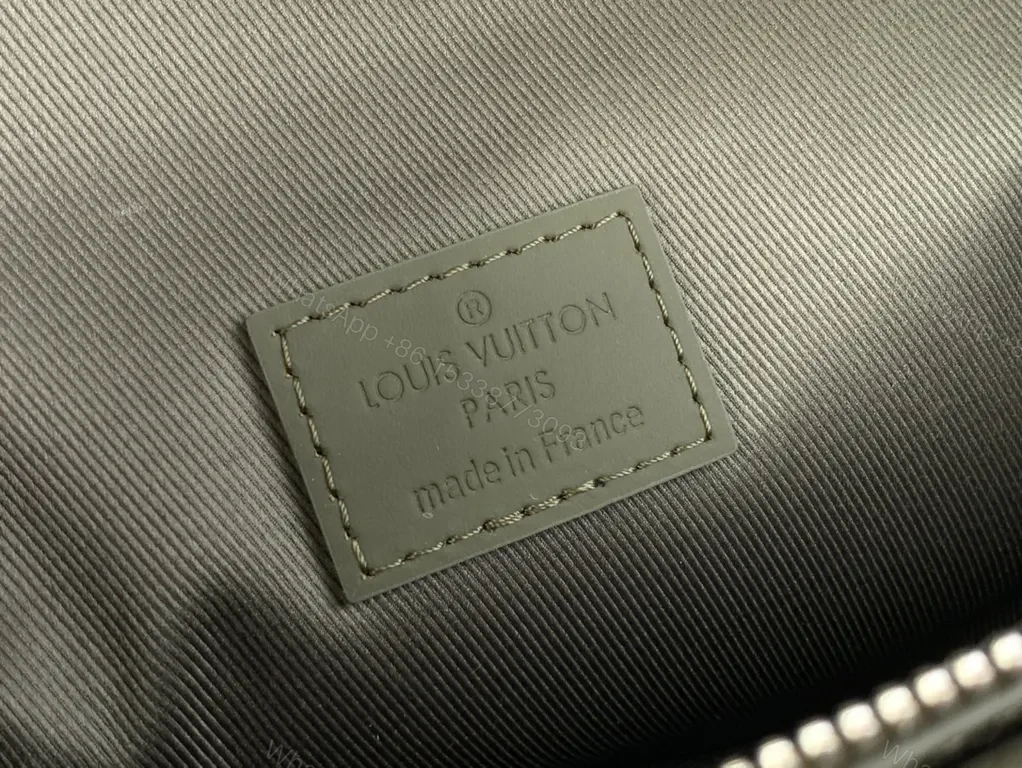 View 5 of Quiet Luxe Compact Crossbody: Pebbled Leather, LV Logo, Gold Hardware