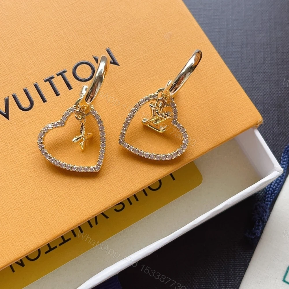 View 3 of LOUIS VUITTON HEART EARRINGS WHITE M02308