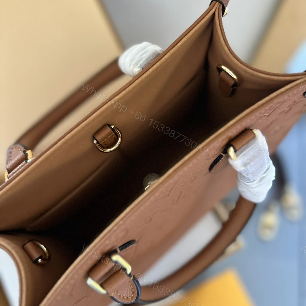 View 5 of Louis Vuitton Onthego MM Monogram Empreinte Cognac 35Cm M12775