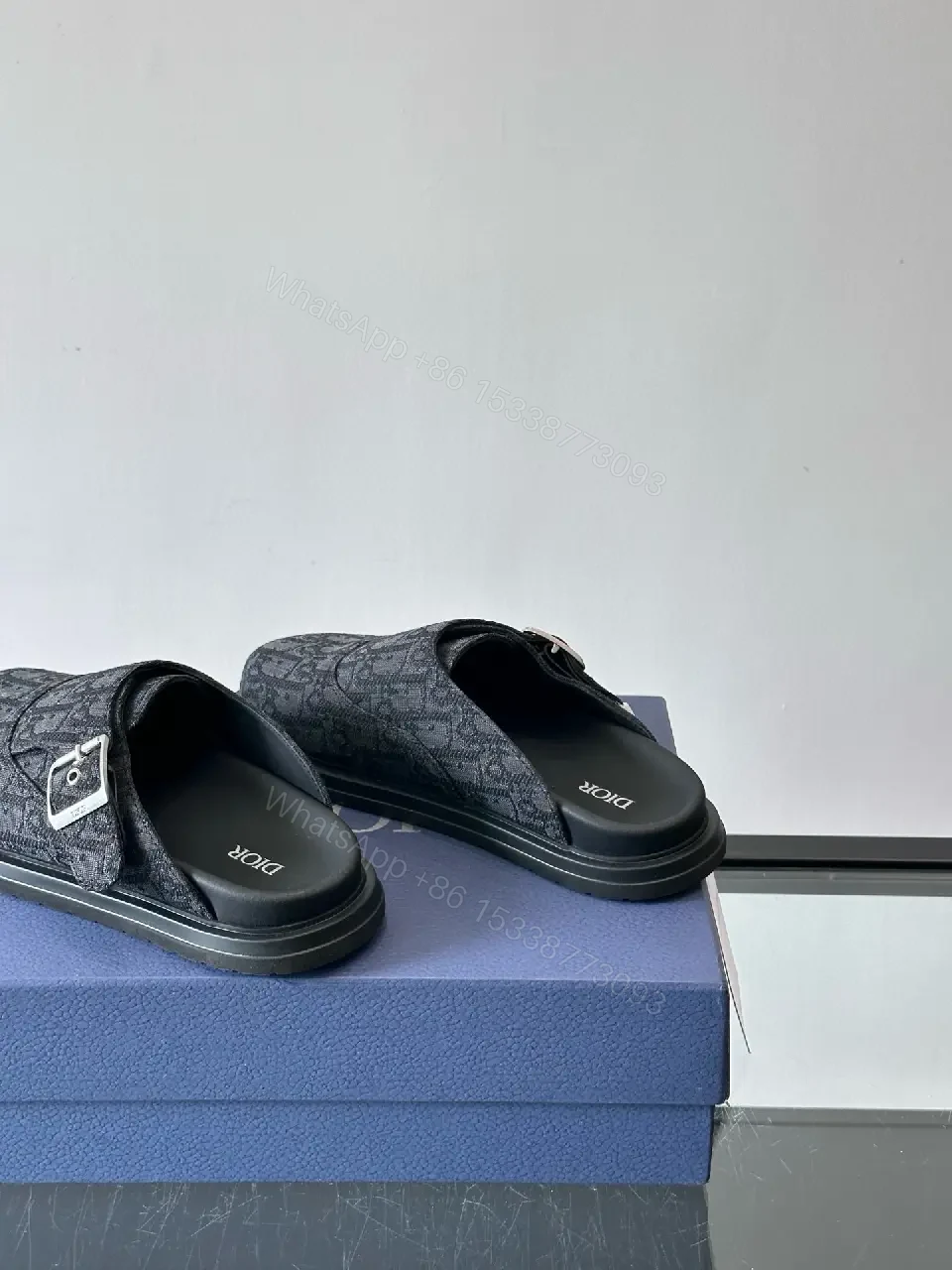 View 10 of Dark Monogram Slip-Ons: Textured Mules with Subtle Buckle