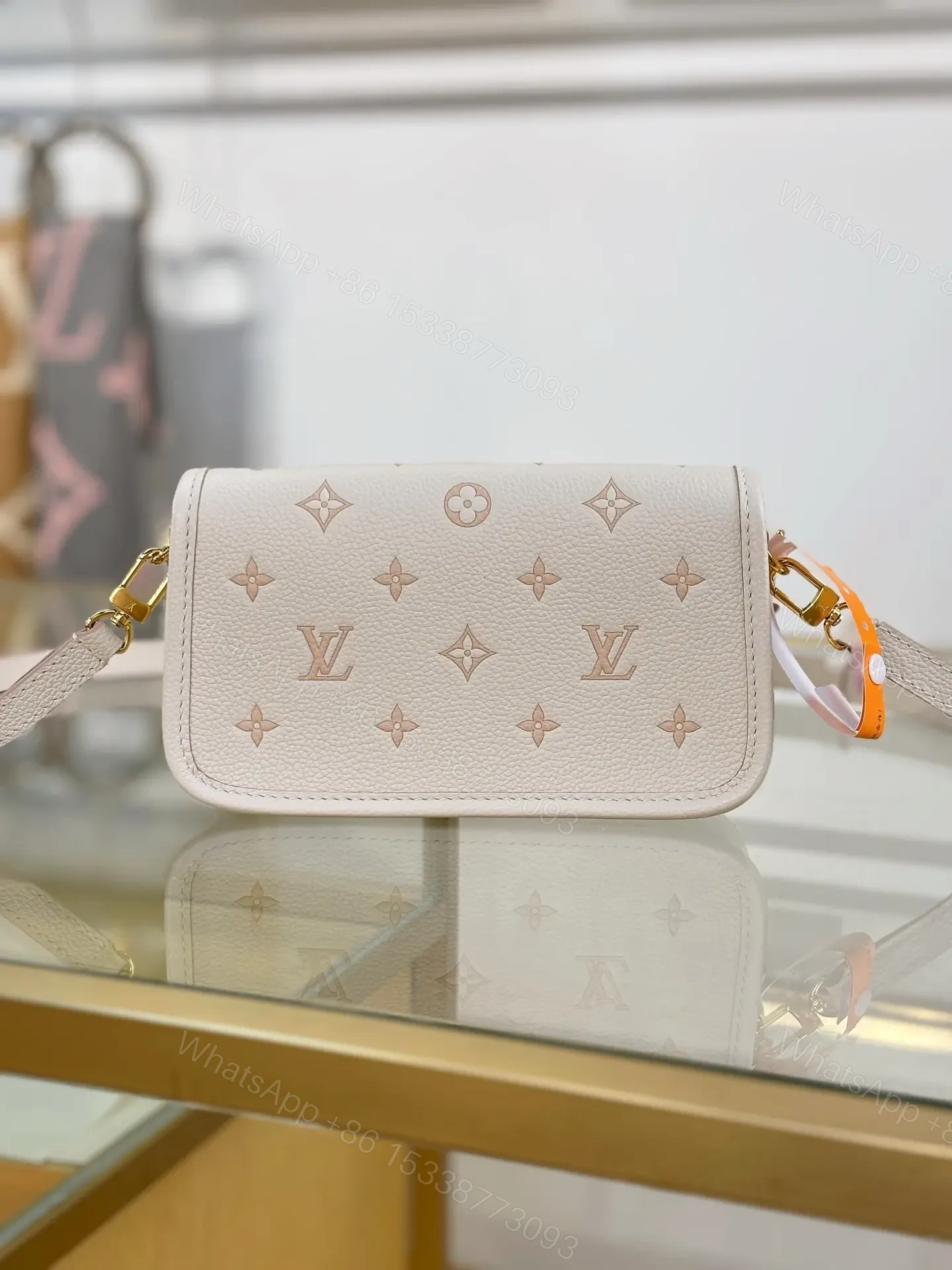View 3 of Louis Vuitton Nano Diane bag in cream Monogram Empreinte
