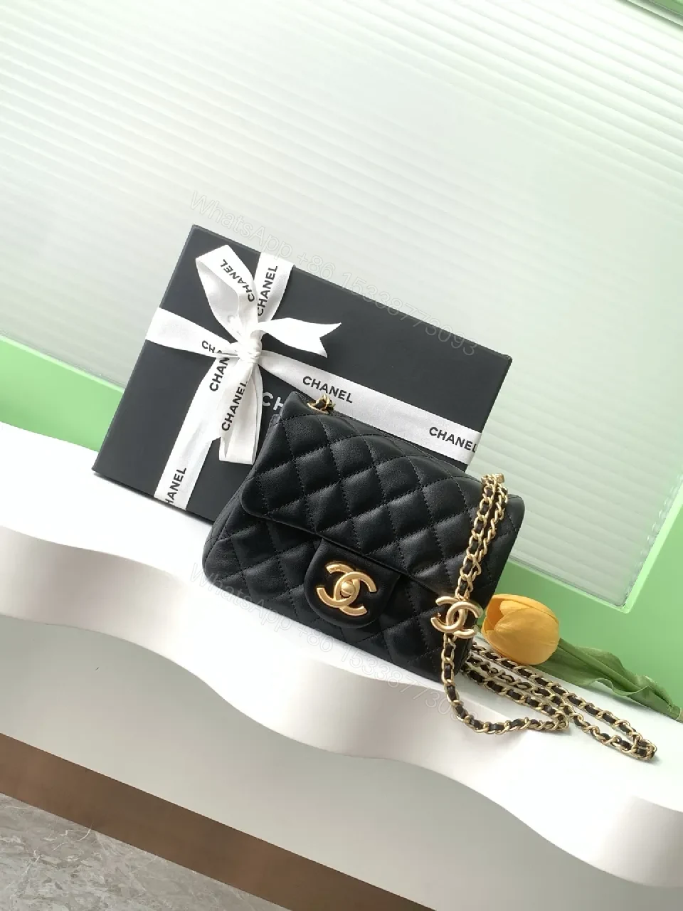 Black Quilted Calfskin Bag - Modern Flap, Gold Chain, Luxe Essential — view 1