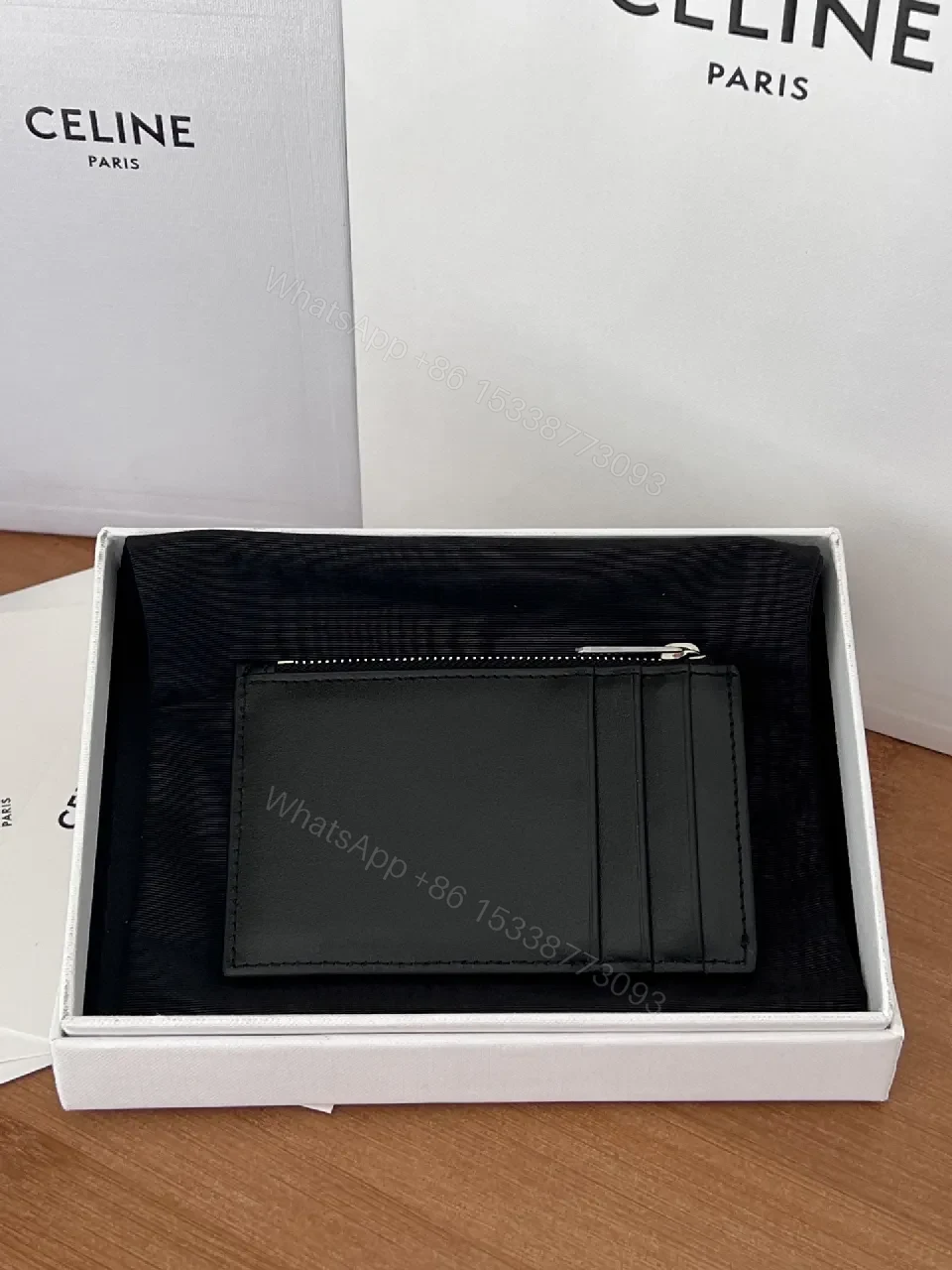 View 4 of Minimalist Black Cardholder: Bold CELINE Print, Compact Luxury