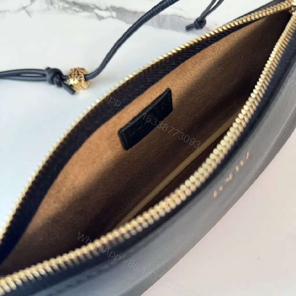 View 6 of Chic Black Leather Crossbody with Gold Hardware