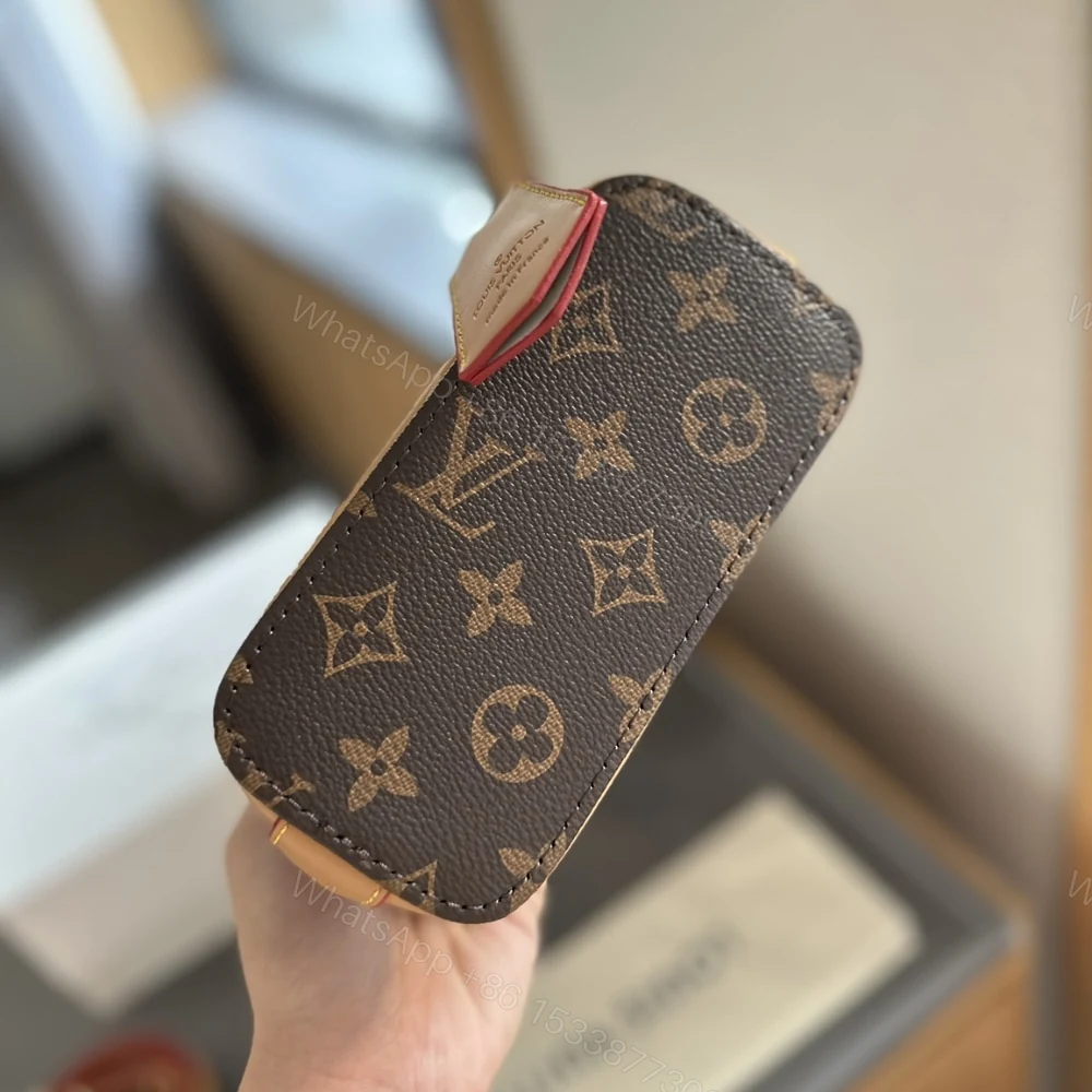View 5 of Louis Vuitton Alma Nano Bag Monogram Brown 18Cm M82717