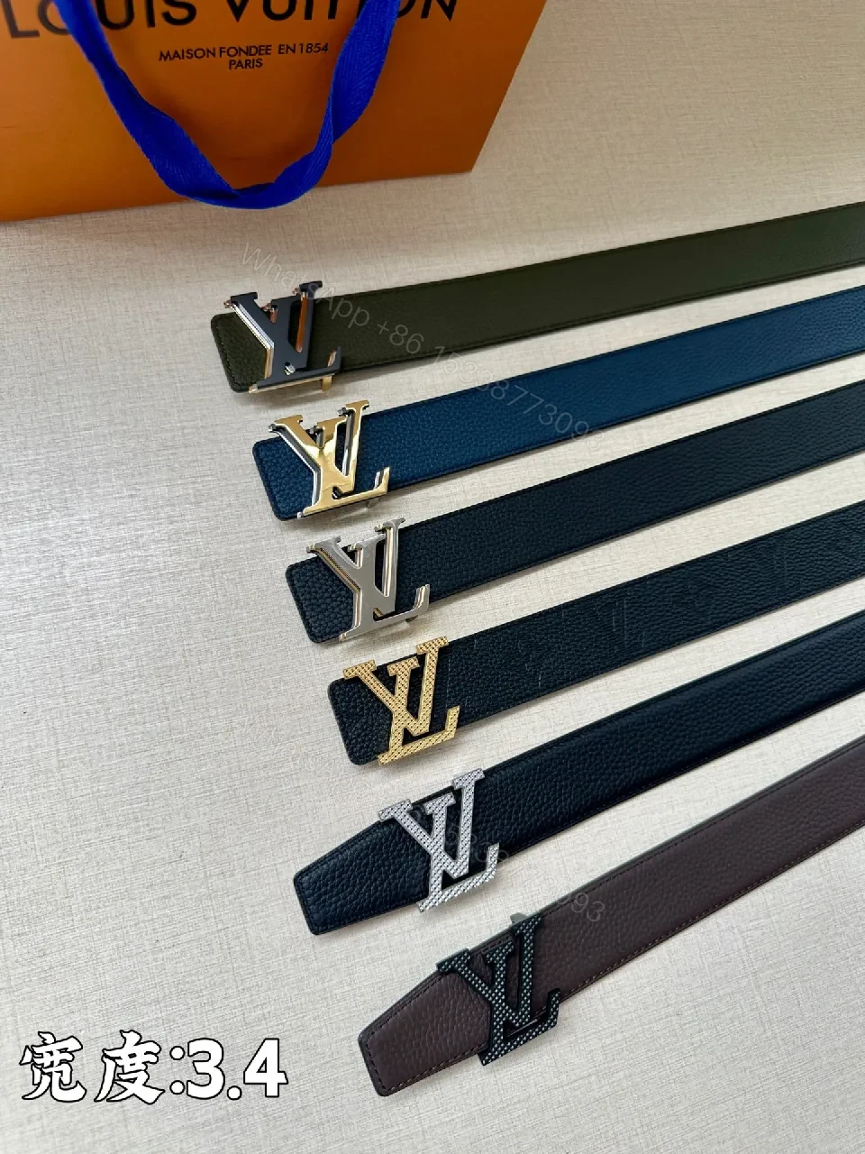 View 2 of Lux Black Pebbled Leather Belt with Iconic Buckle