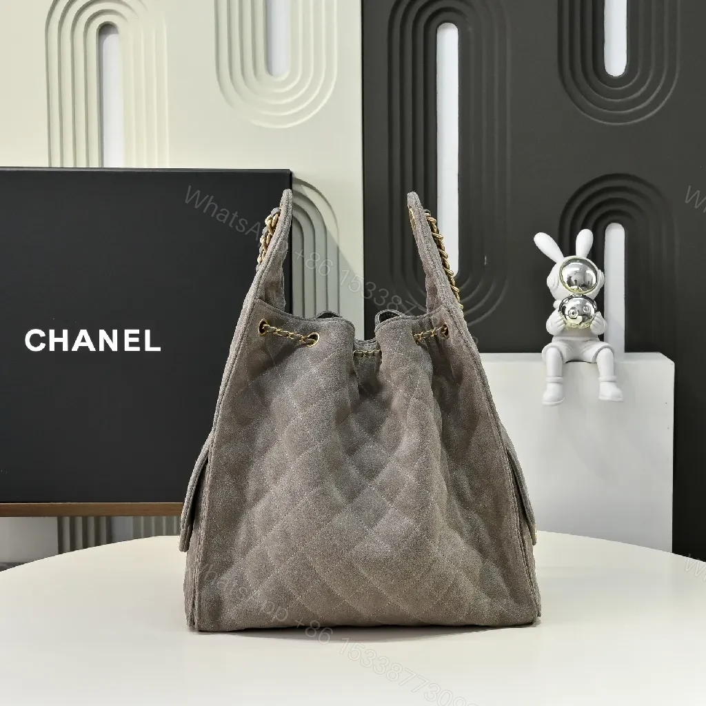 View 6 of Gray Quilted Bucket Bag with Gold Chain – Modern Texture, Everyday Versatility