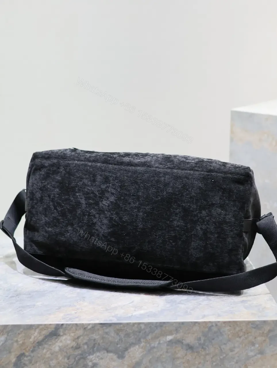 View 4 of Compact Luxe Duffel: Premium Textured Carryall with Subtle Detail