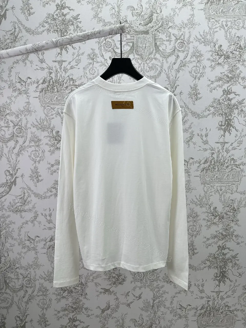 View 10 of Minimalist Luxe White Crewneck with Subtle Embossed DetailTop
