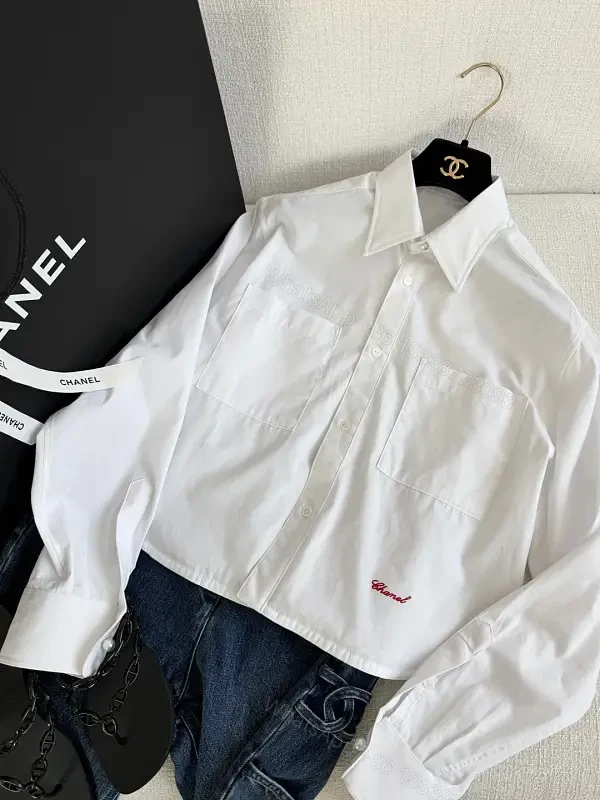 White Cotton Shirt Cropped Style with Red Embroidered Chanel Lettering Shirt — view 1