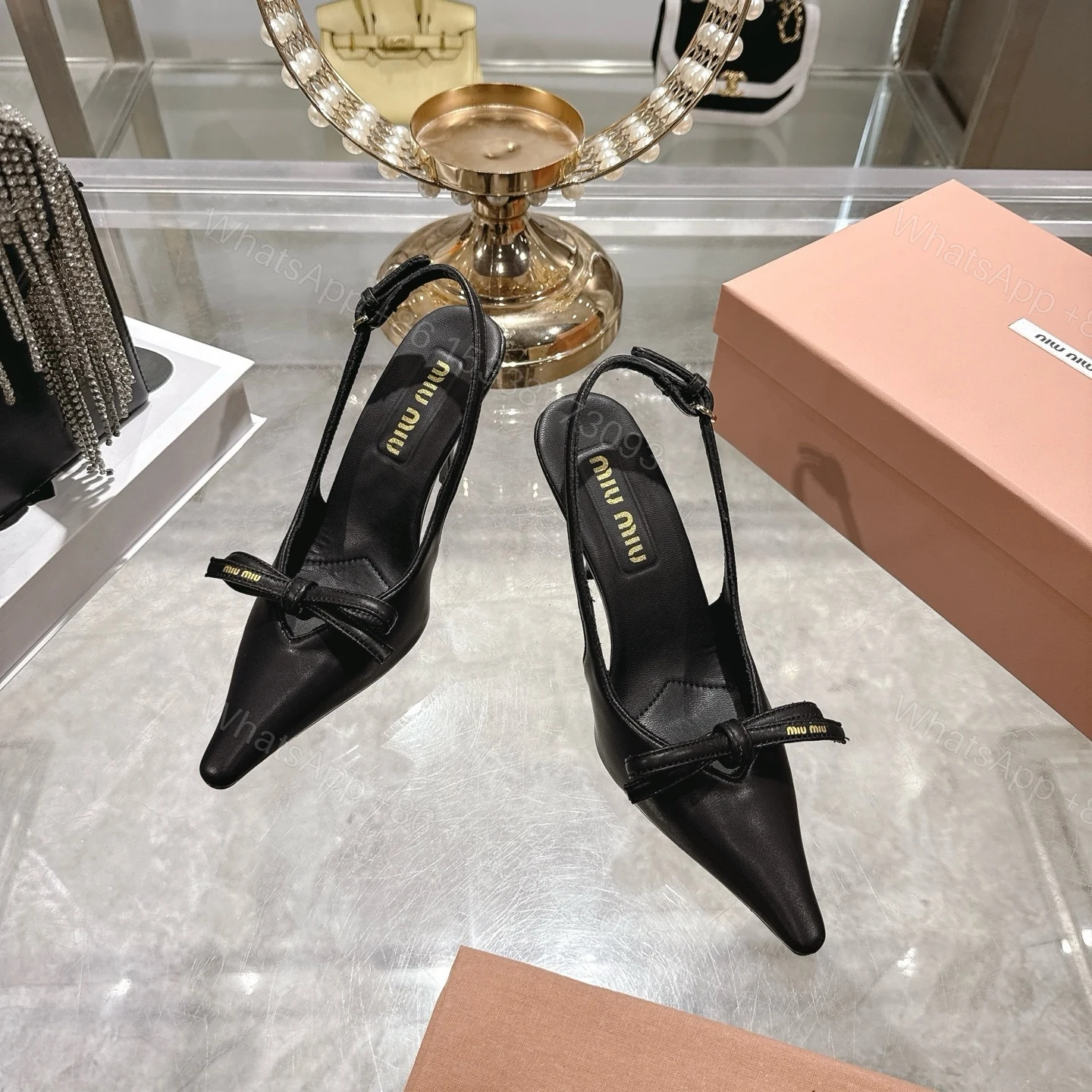 View 3 of Miu Miu Slingback Pumps With Bow Black