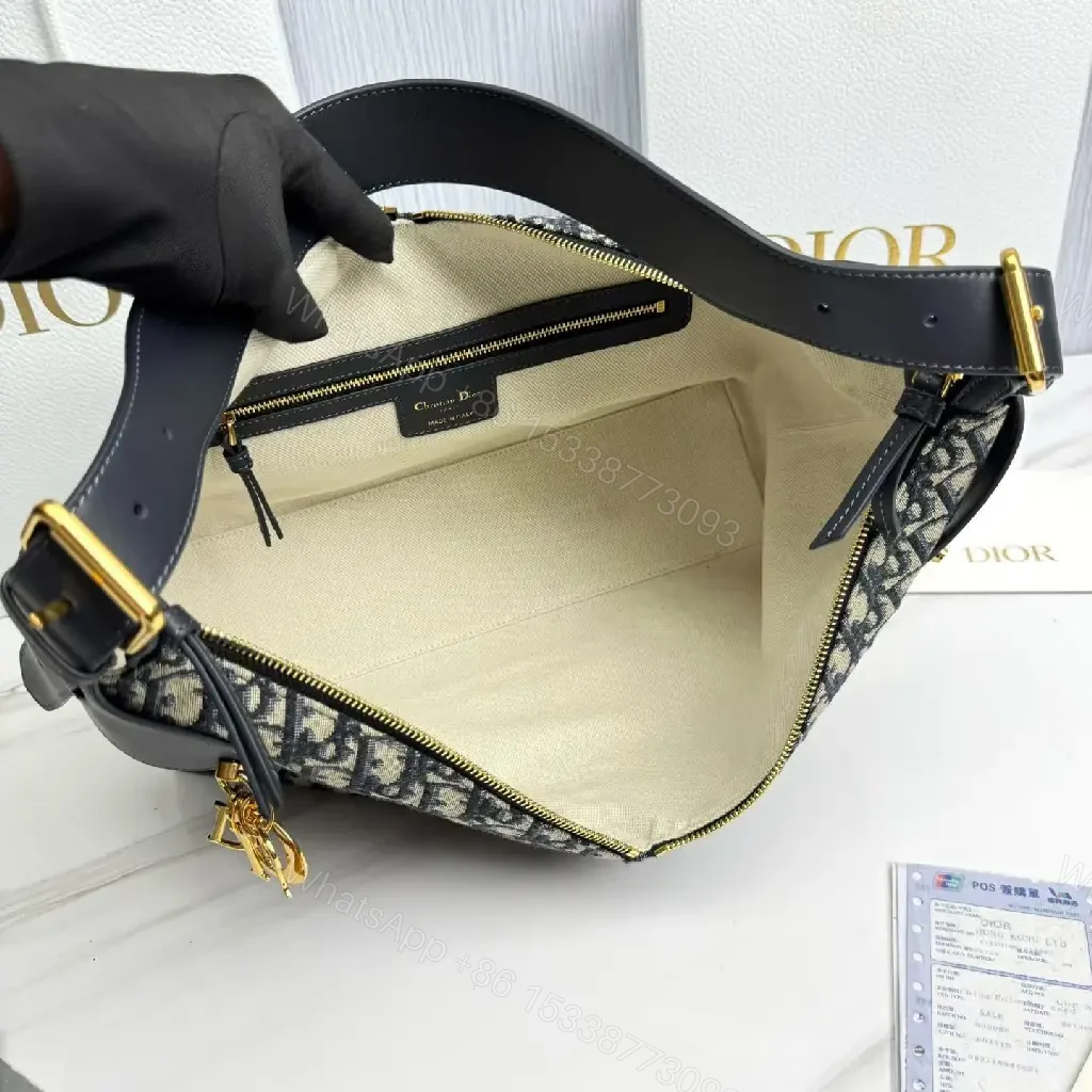 View 5 of Chic Monogram Shoulder Bag: Elegant & Versatile Satchel