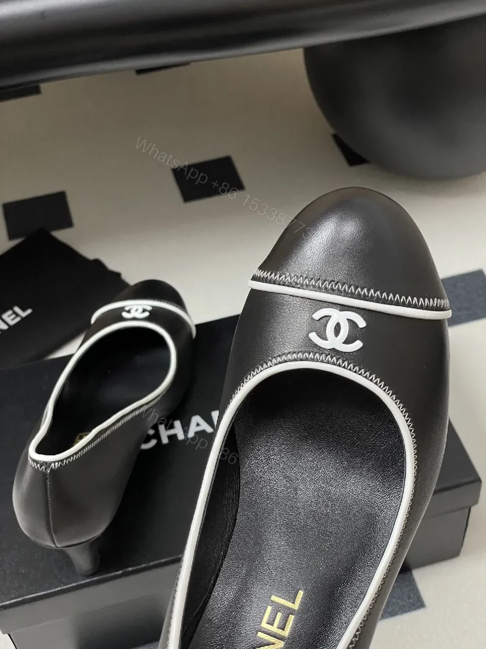 View 3 of Black Leather Kitten-Heel Pumps with Signature Detailing