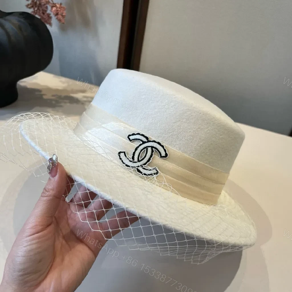 View 9 of Ivory Felt Fedora with Veil & Emblem Accent