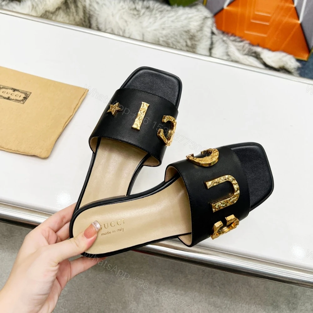 View 3 of GUCCI WOMEN’S LOGO EMBELLISHED SLIDE SANDALS BLACK