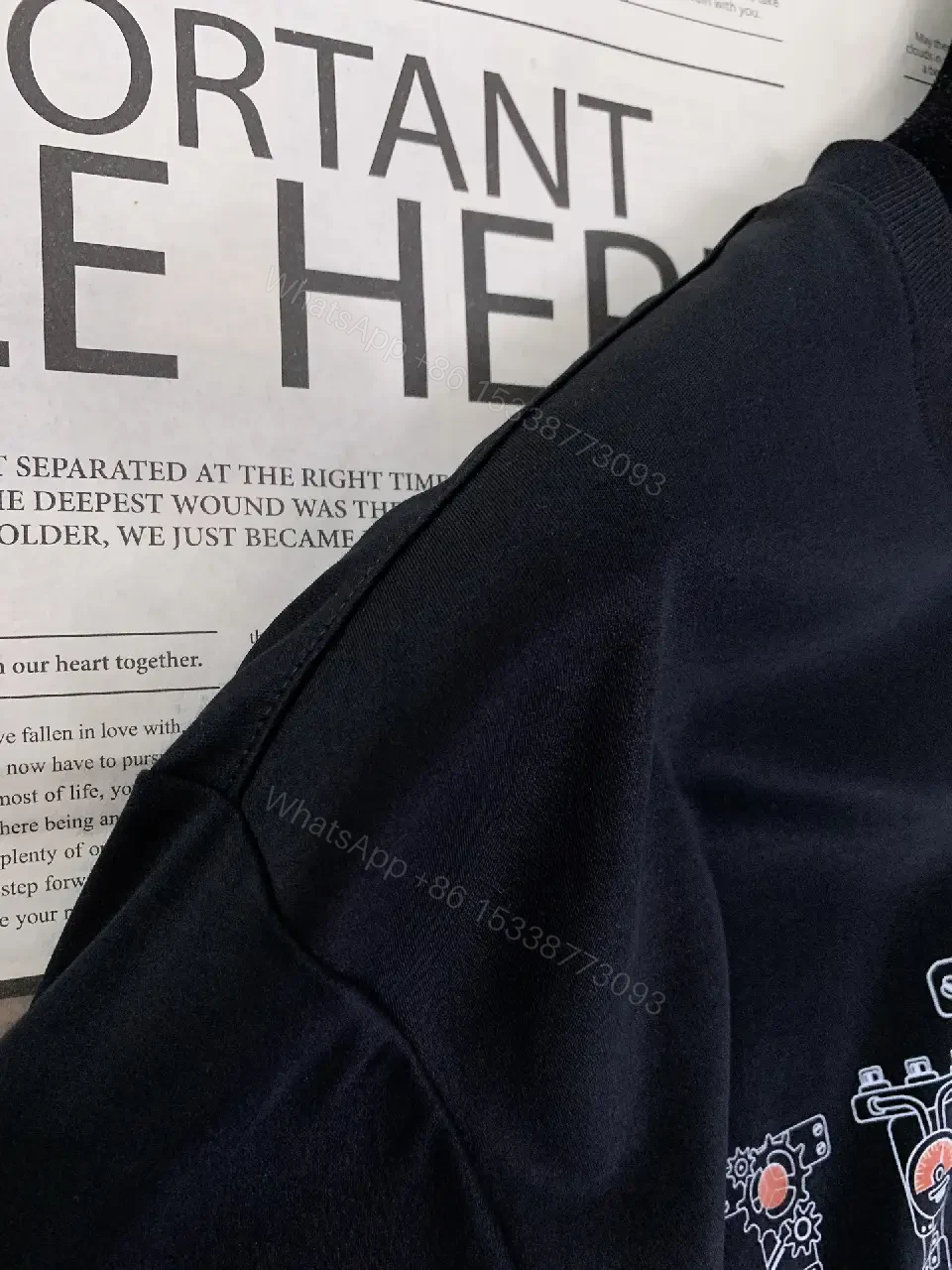 View 9 of Black Cotton Graphic Tee: Luxe-Inspired Statement Tee