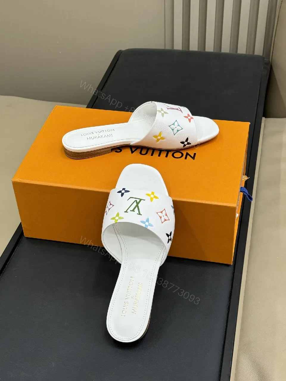 View 2 of White Leather Slides with Multicolor Monogram Detailing - Modern Luxury Comfort