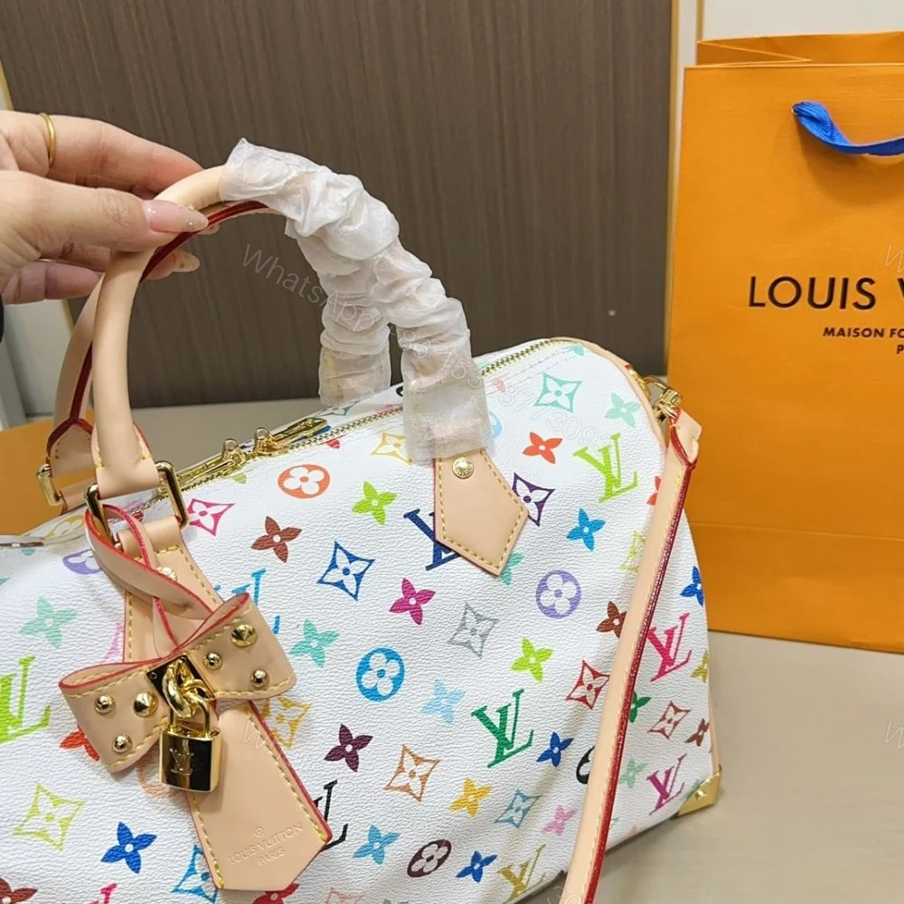 View 2 of Louis Vuitton TM Speedy Soft 30 Multicolor White 30Cm M27789