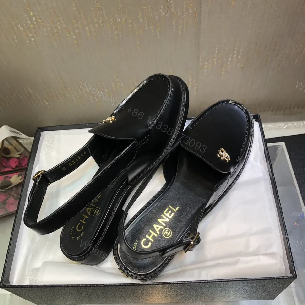 View 5 of Black Leather Mules with Gold Logo Hardware, Minimal Slider Mule