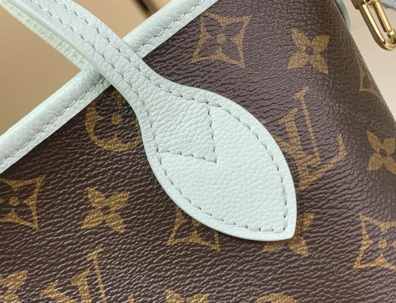 View 7 of Powder Blue Leather Trim Monogram Canvas Tote: Structured Luxury