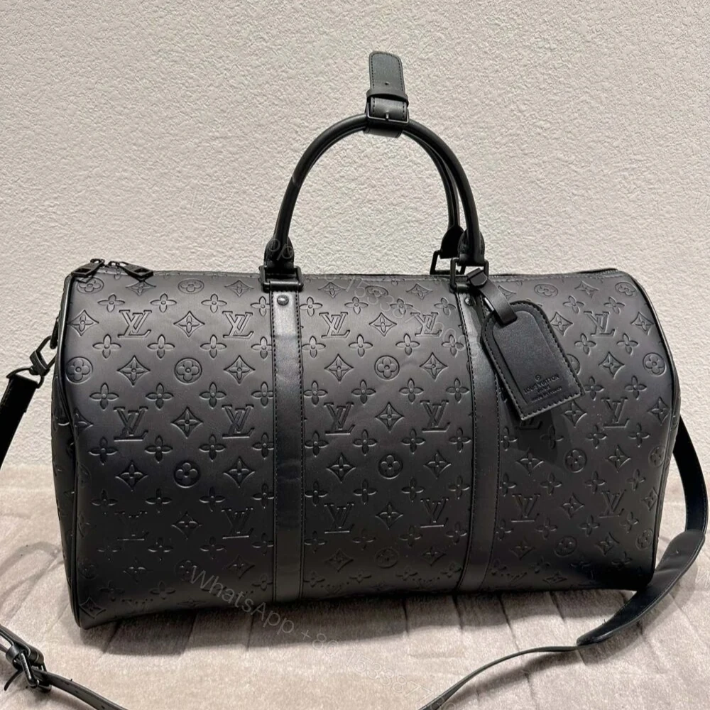 View 2 of Louis Vuitton Keepall Bandoulière 50 Black 50Cm M44810