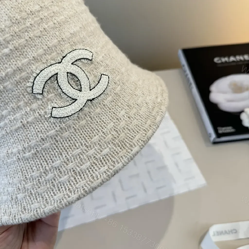View 4 of Soft-knit White Bucket Hat with Subtle Logo Embroidery