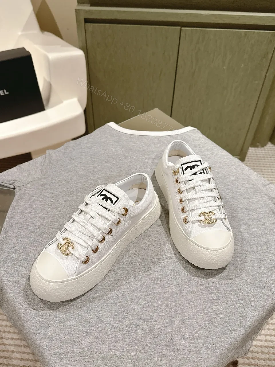 View 5 of White Leather High-Top Sneakers with Gold Accents