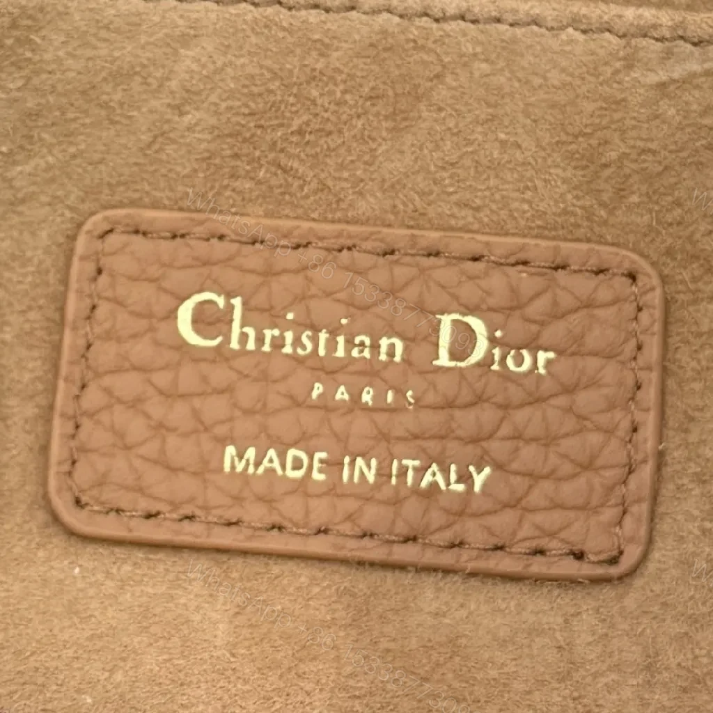 View 9 of Saddle Tan Leather Bag: Chic, Compact, Day-to-Night Luxury