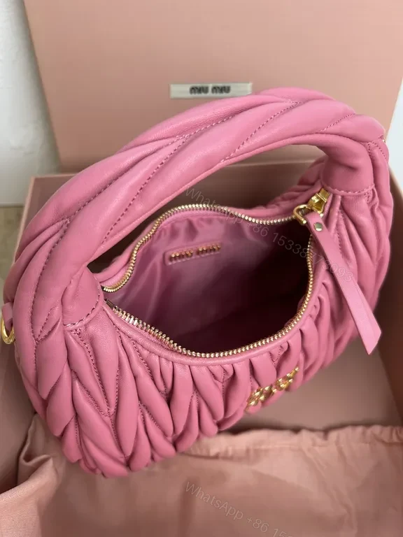 View 9 of Pink Quilted Miu Miu Mini Bag â€“ Luxury Everyday Chic