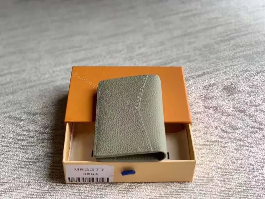 View 3 of Sage-Grain LV Card Holder: Subtle Signature, Slim Portability
