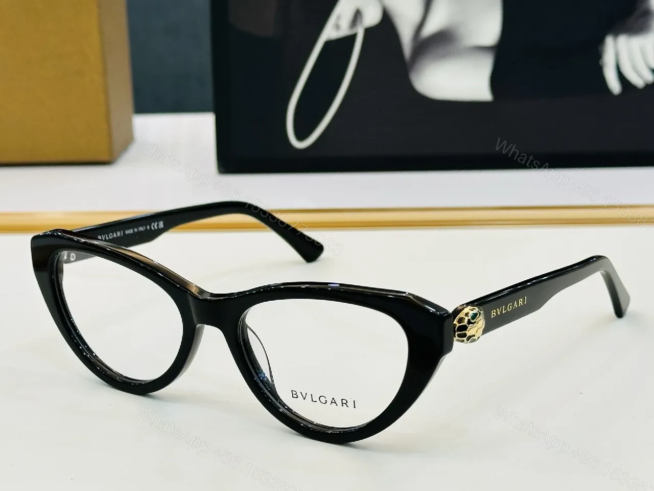 Bold Cat-Eye Black Frames with Gold-Accent Sunglasses — view 1