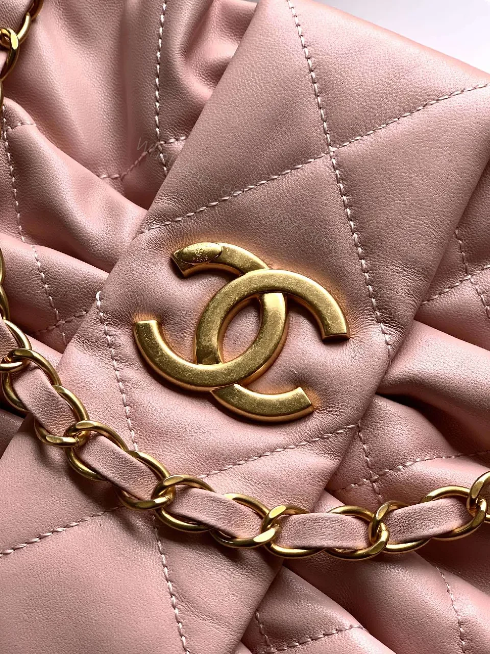 View 7 of Soft Pink Quilted Handbag with Gold Accents, Compact Luxury Tote