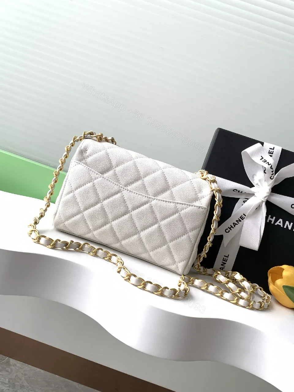 View 2 of Quilted Mini Flap Bag with Gold Chain - Classic Chic Crossbody
